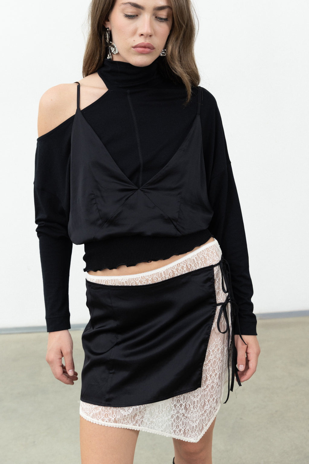Front view of the Sacro Top showing the satin overlay on fine straps and the shirred silk waist panel