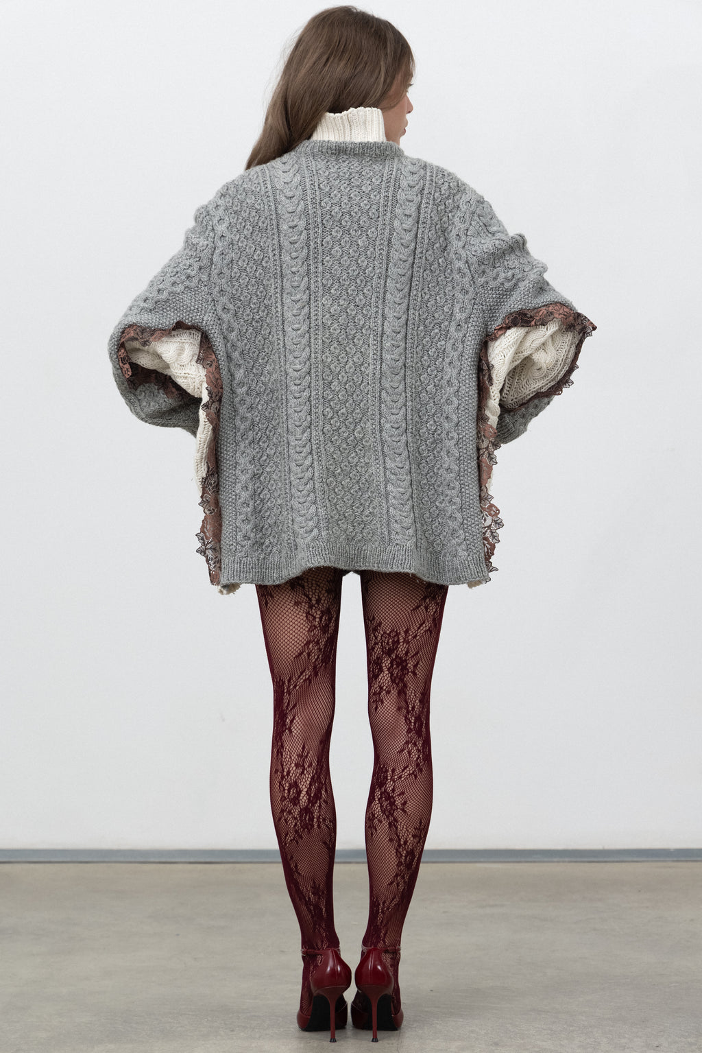 Back view of the oversized grey Dimenticato Wool Cardigan