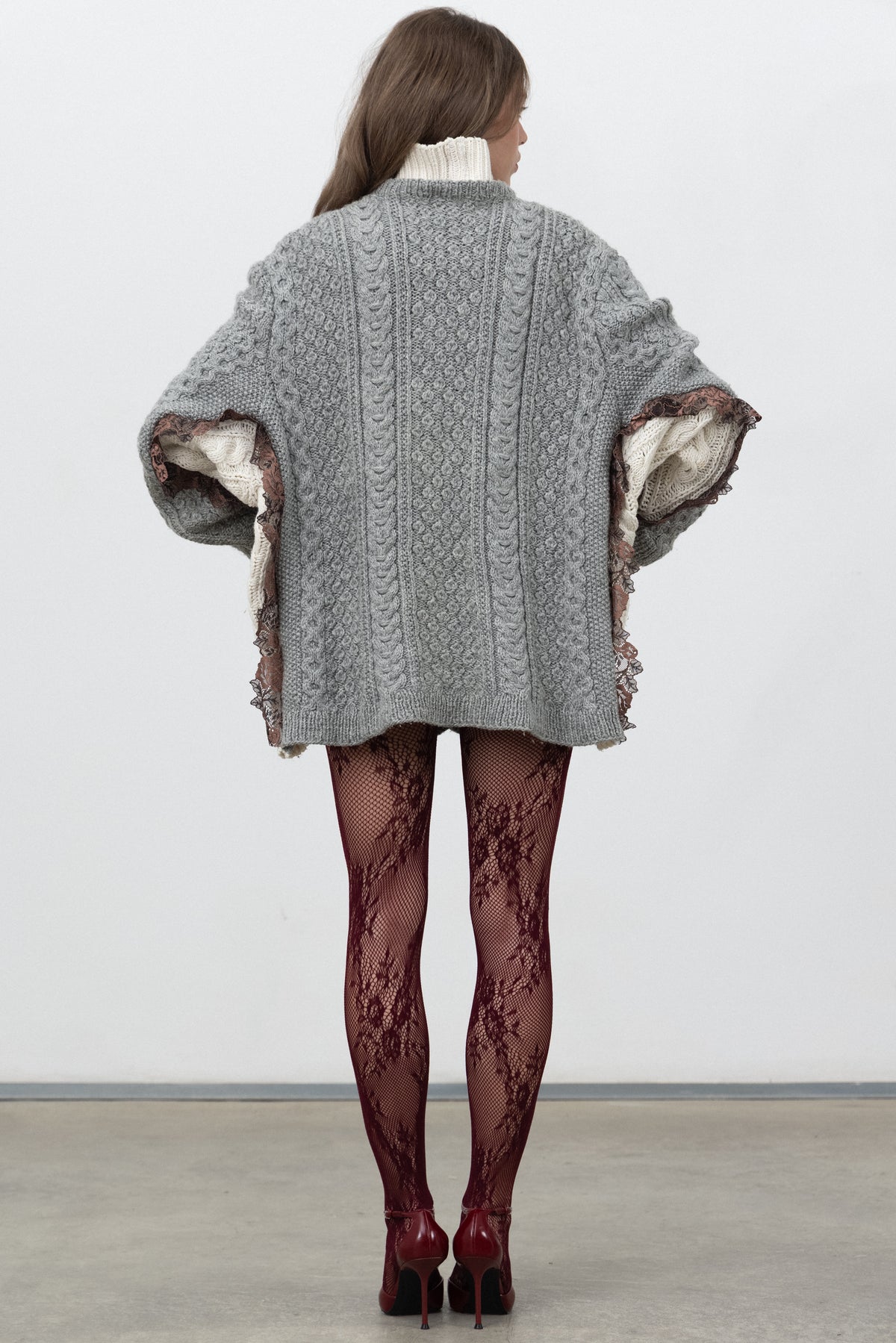 Back view of the oversized grey Dimenticato Wool Cardigan