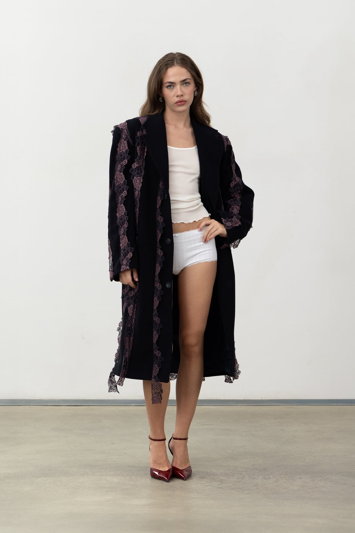 Full-length view of the below-knee Rinascimento navy wool coat