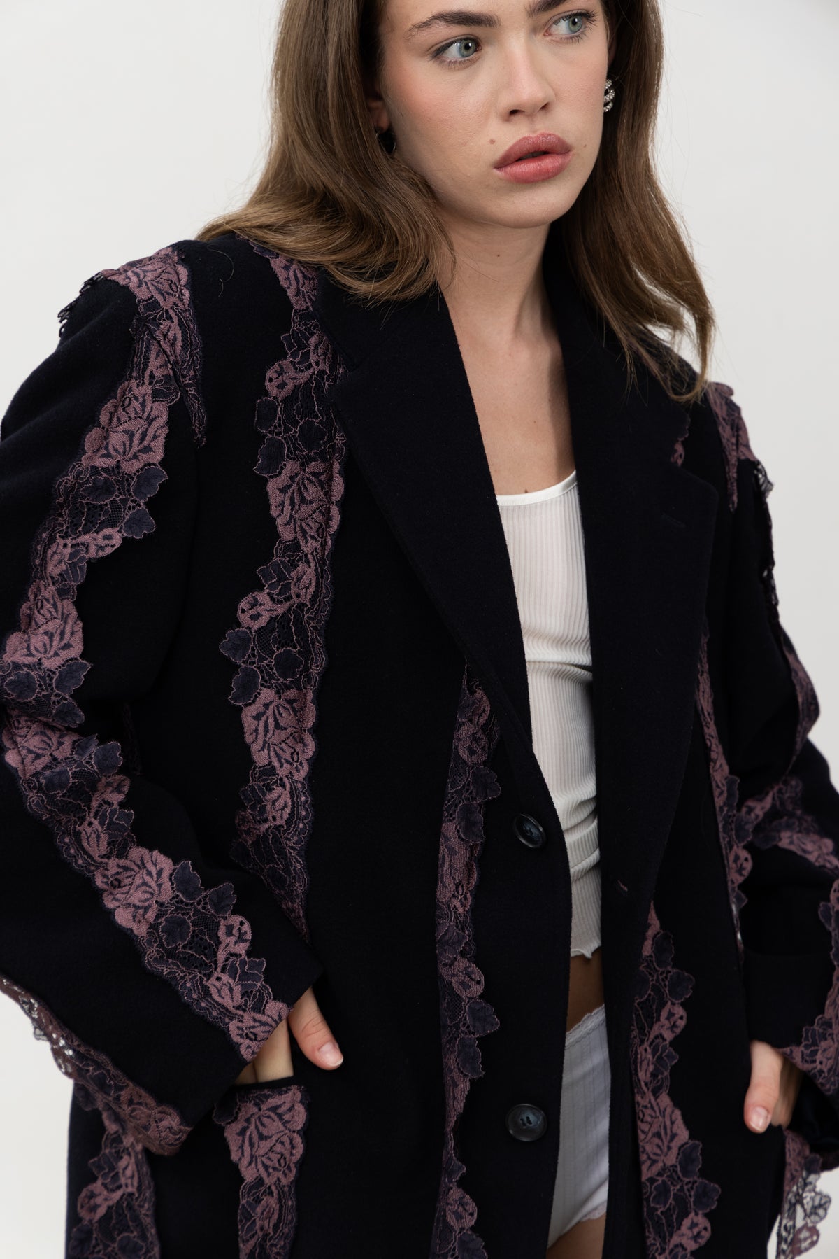 Rinascimento Coat, a long navy wool coat with bands of purple lace, Oscalito x Canto Primo