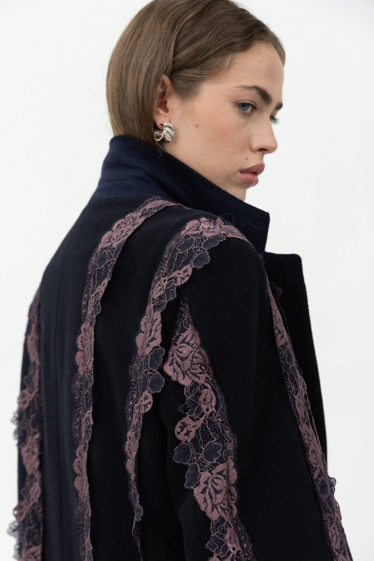 Back detail of the collar and purple lace bands on the Rinascimento Coat