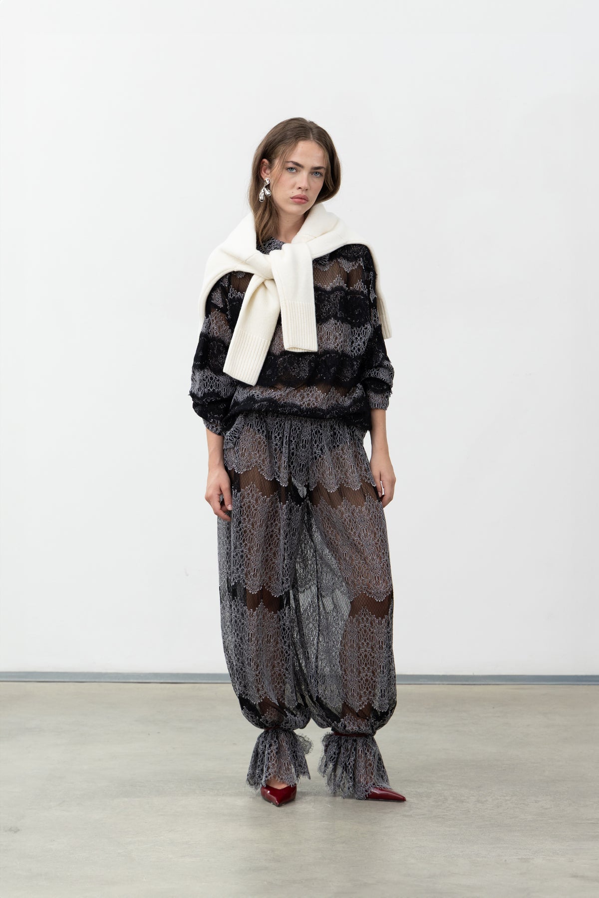Sbagliato Dark Pants, black lace balloon pants with white yarn, styled with the Sbagliato Dark Top, Oscalito x Canto Primo