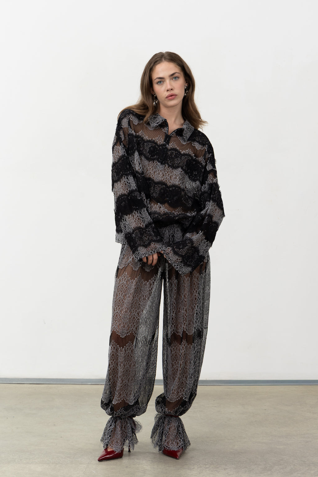 Full-length view of the Sbagliato Dark Top worn with the matching Sbagliato Dark Pants