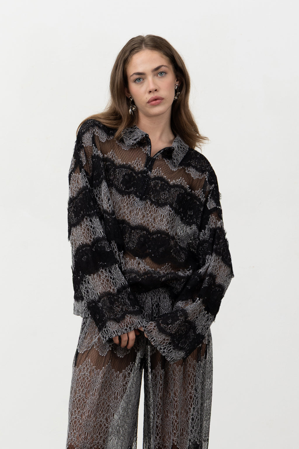 Sbagliato Dark Top, an oversized black lace polo with tone-on-tone lace stripes, front view, Oscalito x Canto Primo
