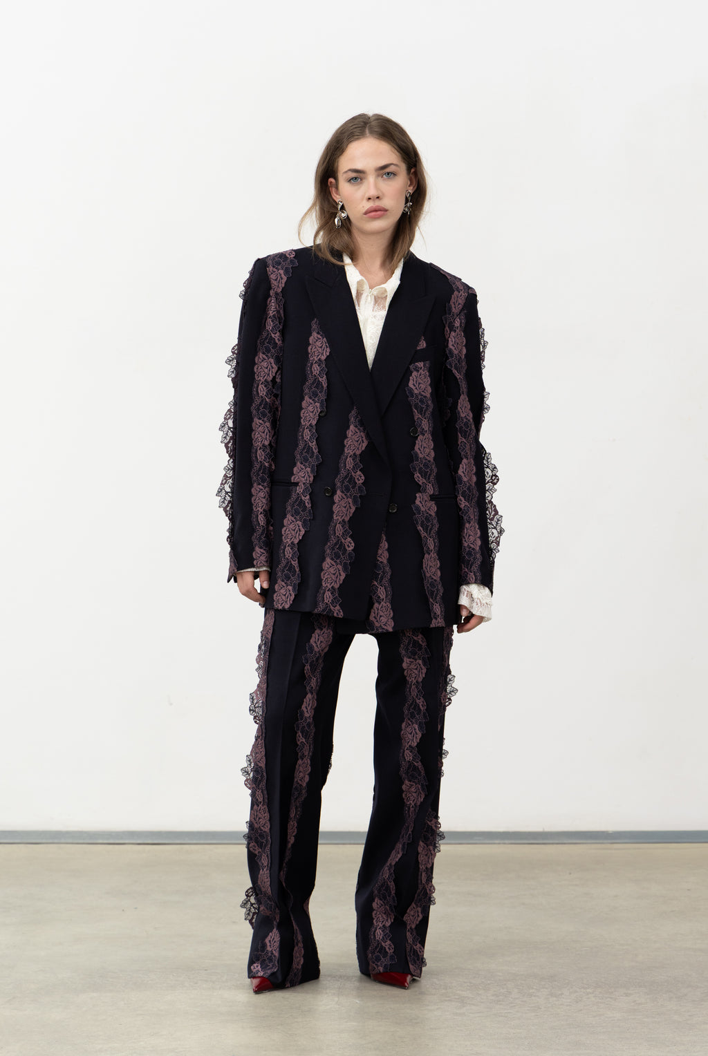 Front view of the genderless Rinascimento navy wool blazer with structured shoulders