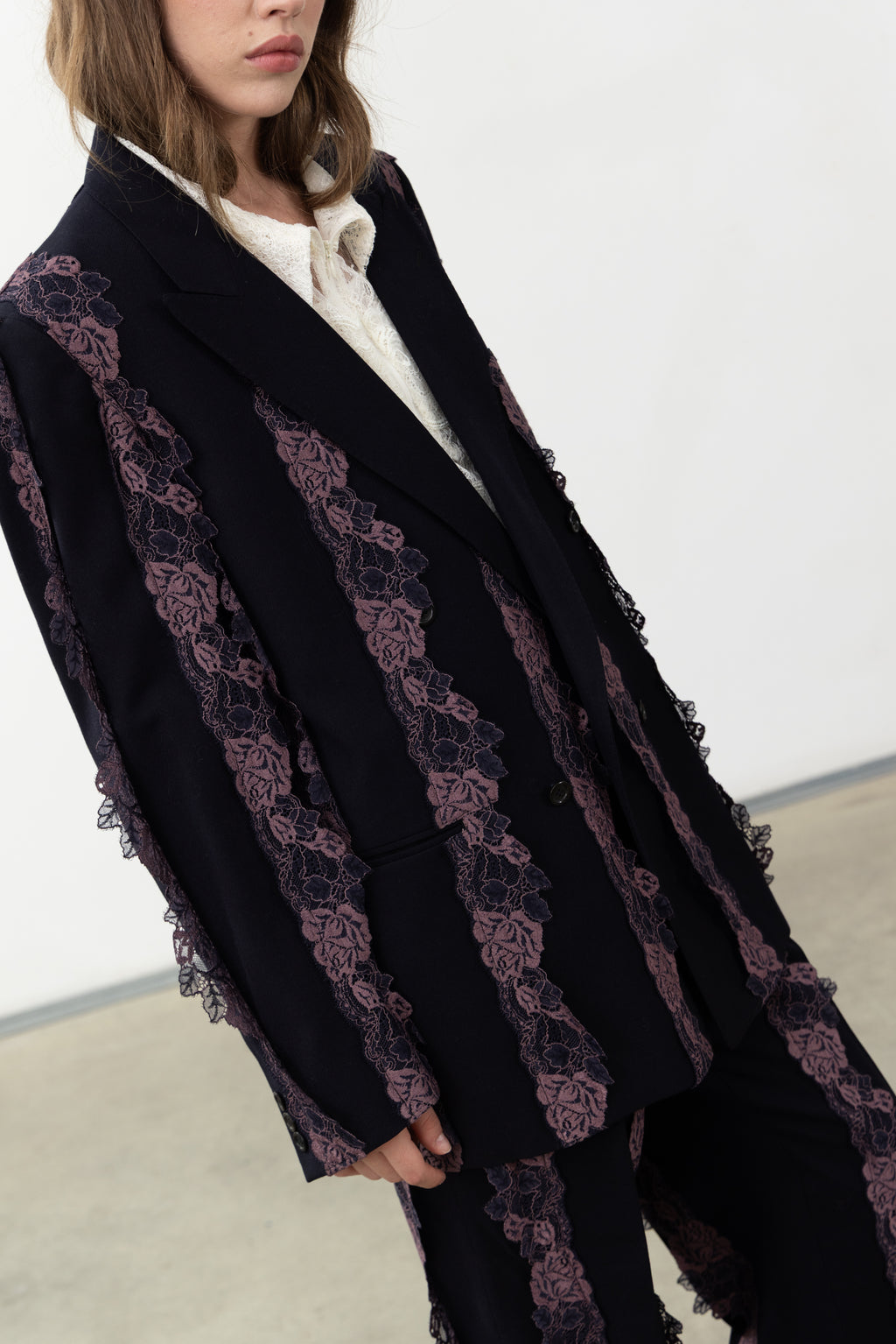 Close-up of the purple lace bands on the navy wool Rinascimento Blazer
